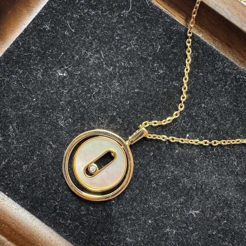 Double sided mother of pearl and rose gold plated